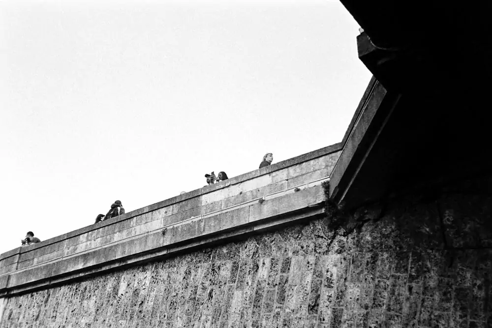Tourist on a bridge in Paris
